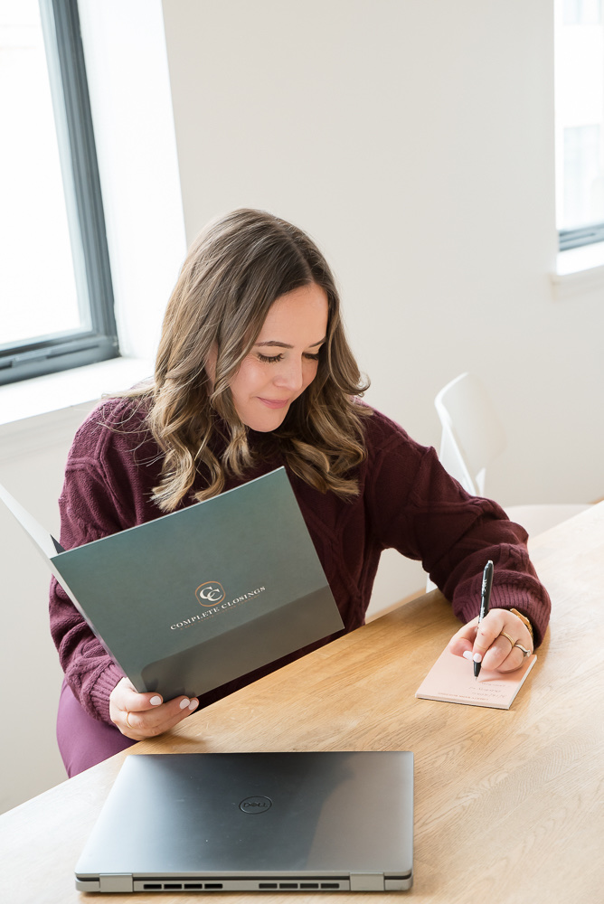Erin N. Rice Petrillo preparing closing documents