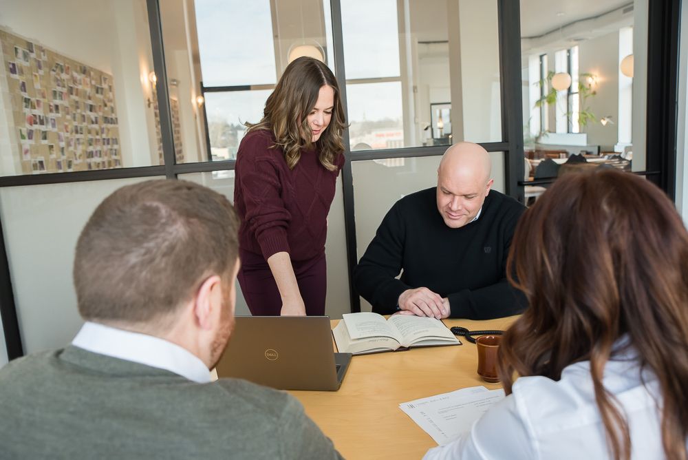 The Complete Closings team working through a closing together